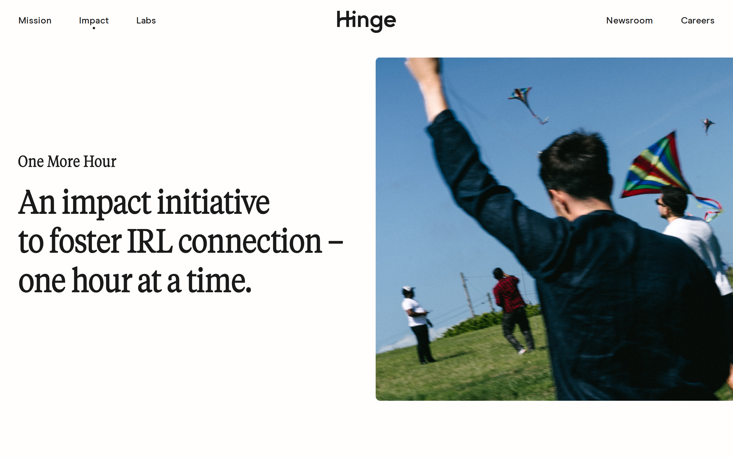 Hinge impact page describing One More Hour as an impact initiative to foster IRL connection, next to a photo of people flying kites on a grassy hill.