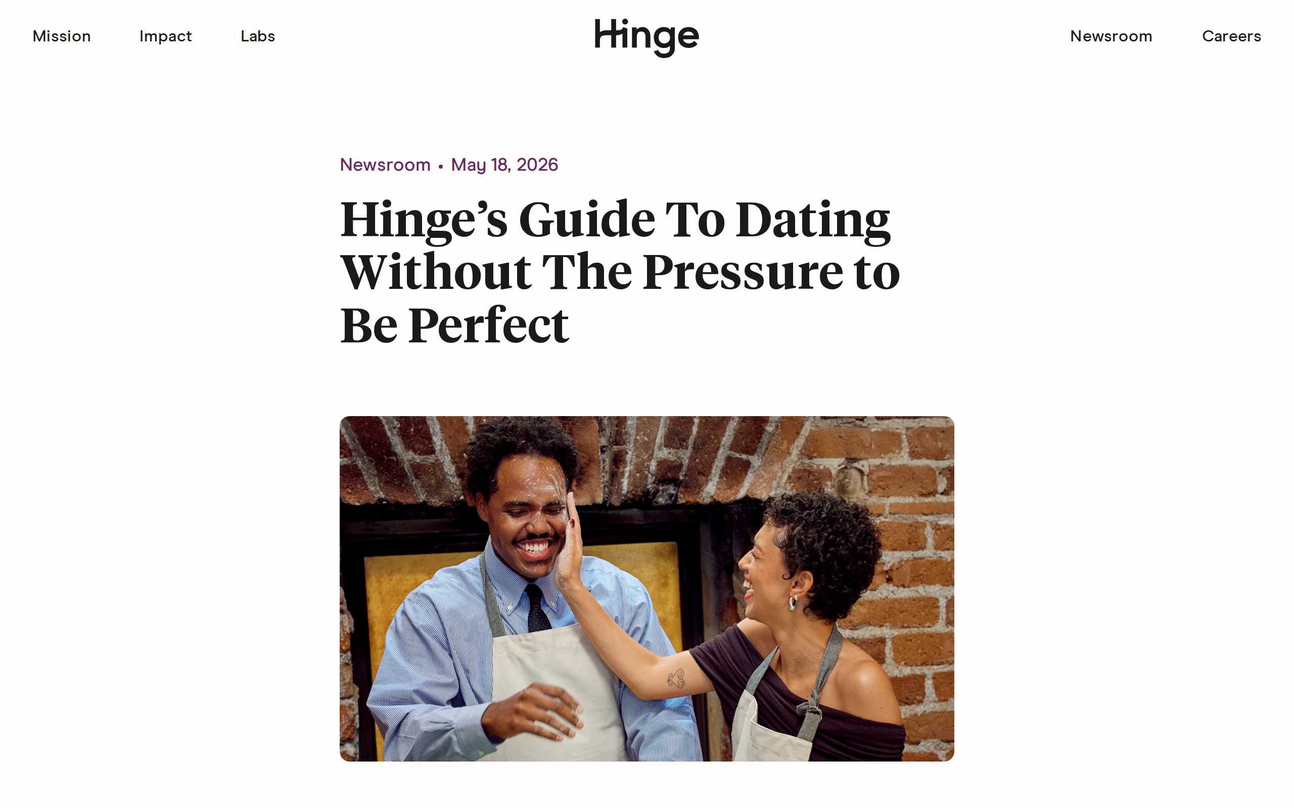 Hinge newsroom article headlined 'Hinge's Guide To Dating Without The Pressure to Be Perfect', dated May 18 2026, above a photo of a laughing couple in aprons smearing flour on each other.